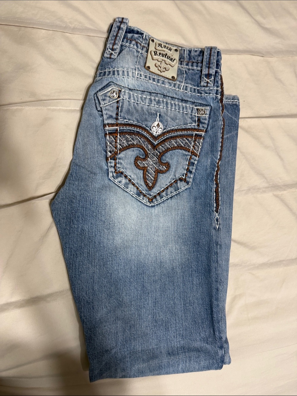 Rock Revival Light Blue Boot Cut Jeans with Brown Embroidery
